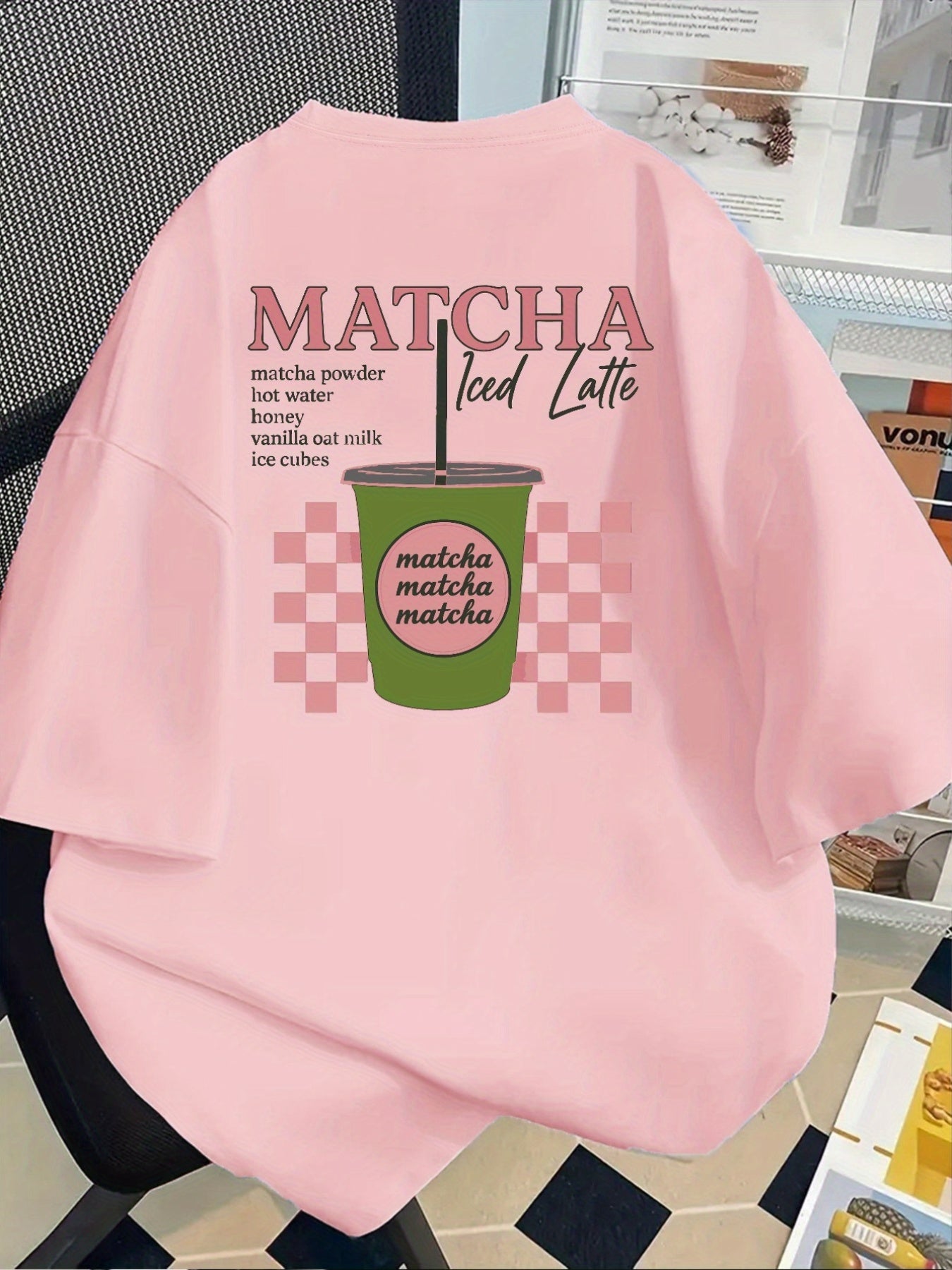 [Trendy, Matcha Lover Tee] Trendy Casual Tee - Women's Matcha Lover Graphic Tee | Light Pink with Green & White Checkered Design, "Matcha Powder Hot Water Vanilla Oat Milk Ice Cubes" Print, Casual Short Sleeve Crew Neck, Perf